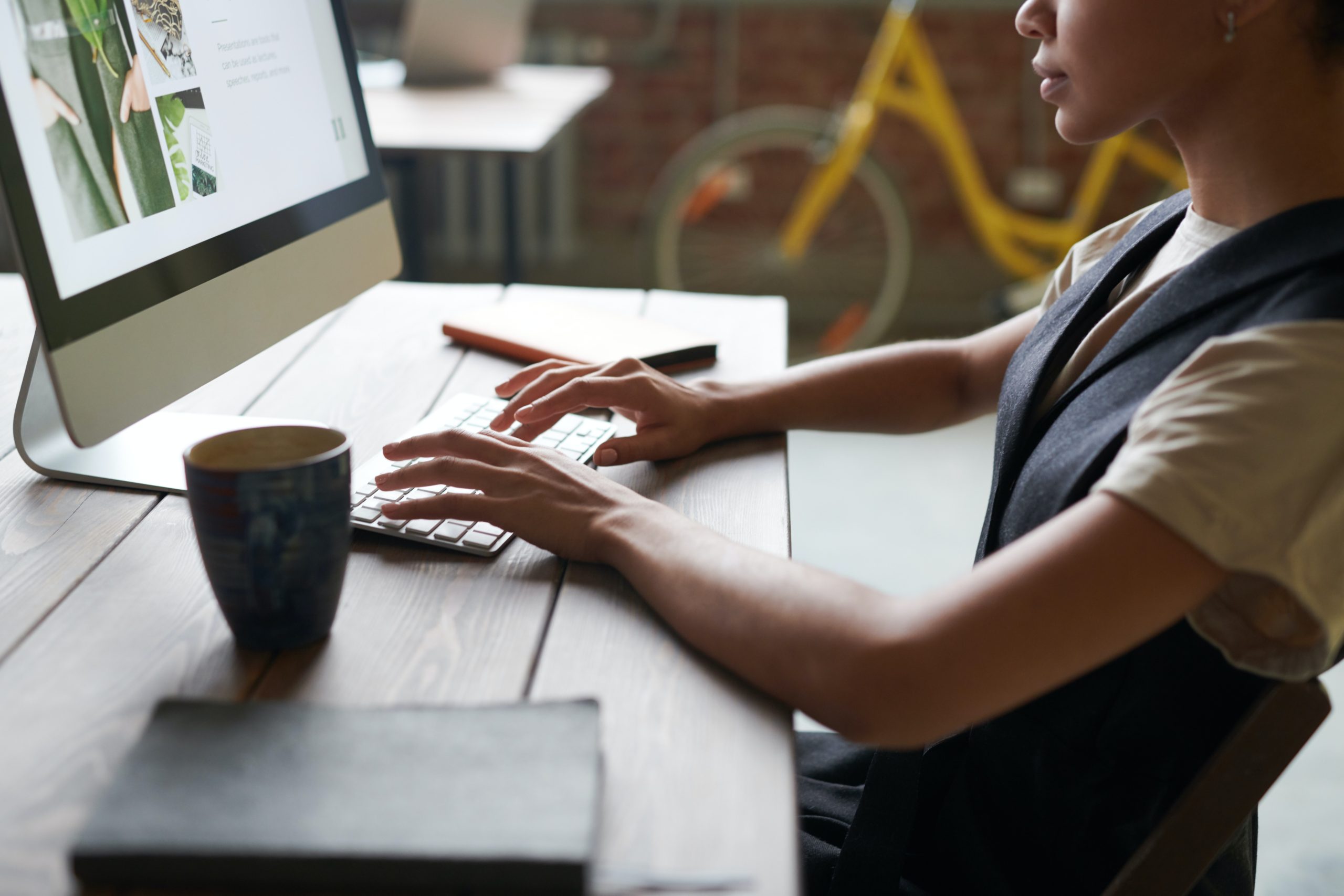 Small business owners organizing financial statements and a loan application checklist at a conference table